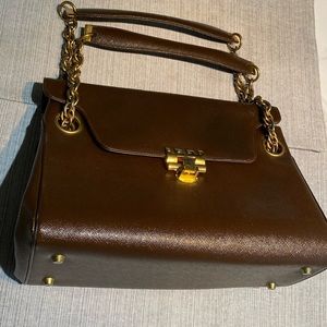 Never used brown leather purse. Comes with a change purse